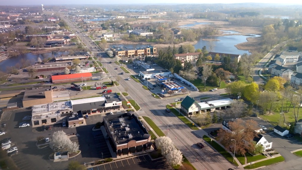 Drone overview of a community near a waterway  