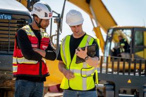GPRS Project Manager SiteMap & Contractor looks at ipad together.