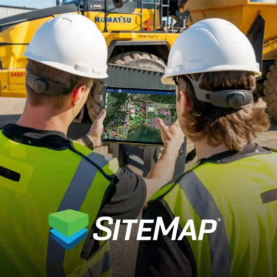Contract workers using SiteMap® on a digital tablet at a worksite