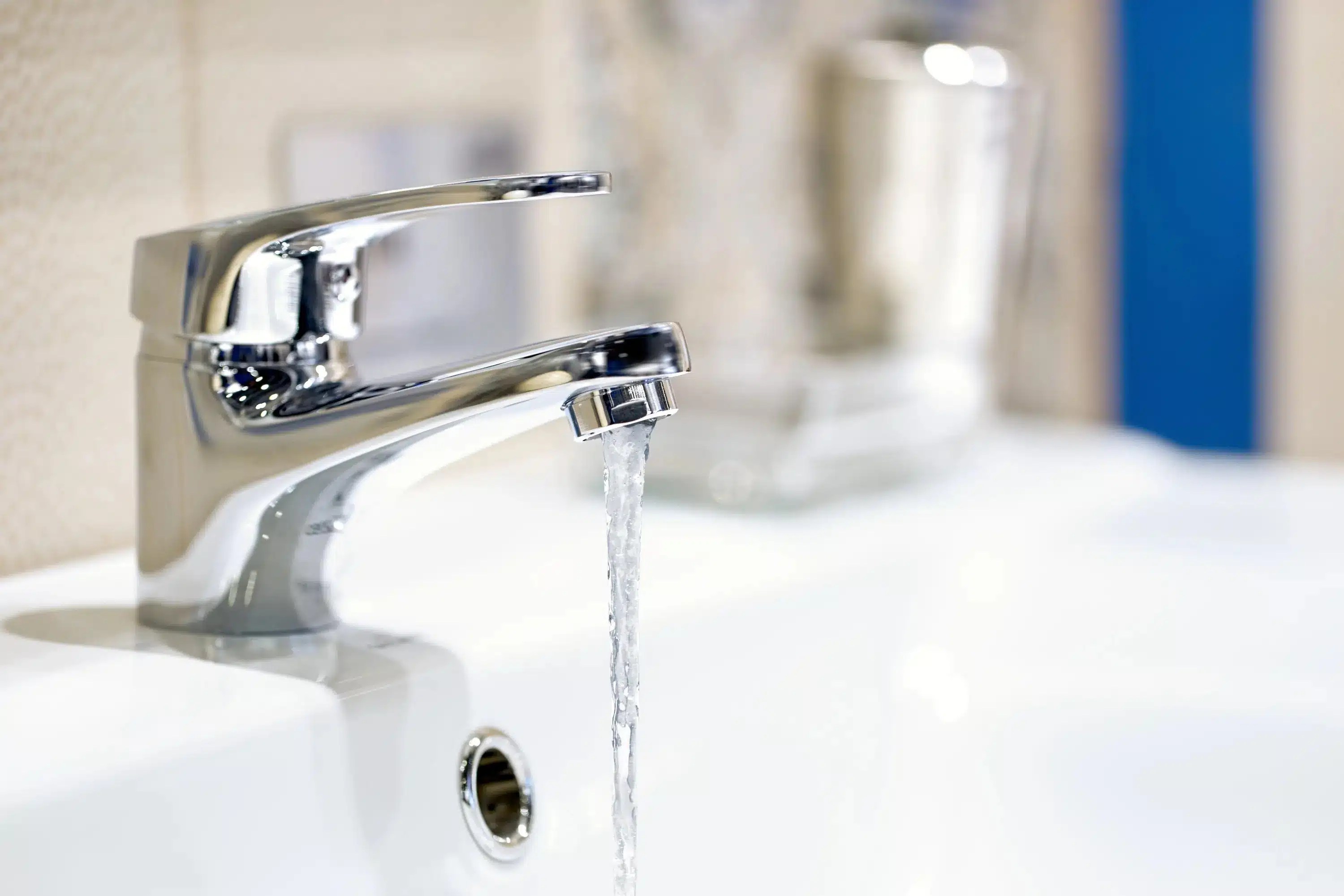 faucet running water in a bathroom