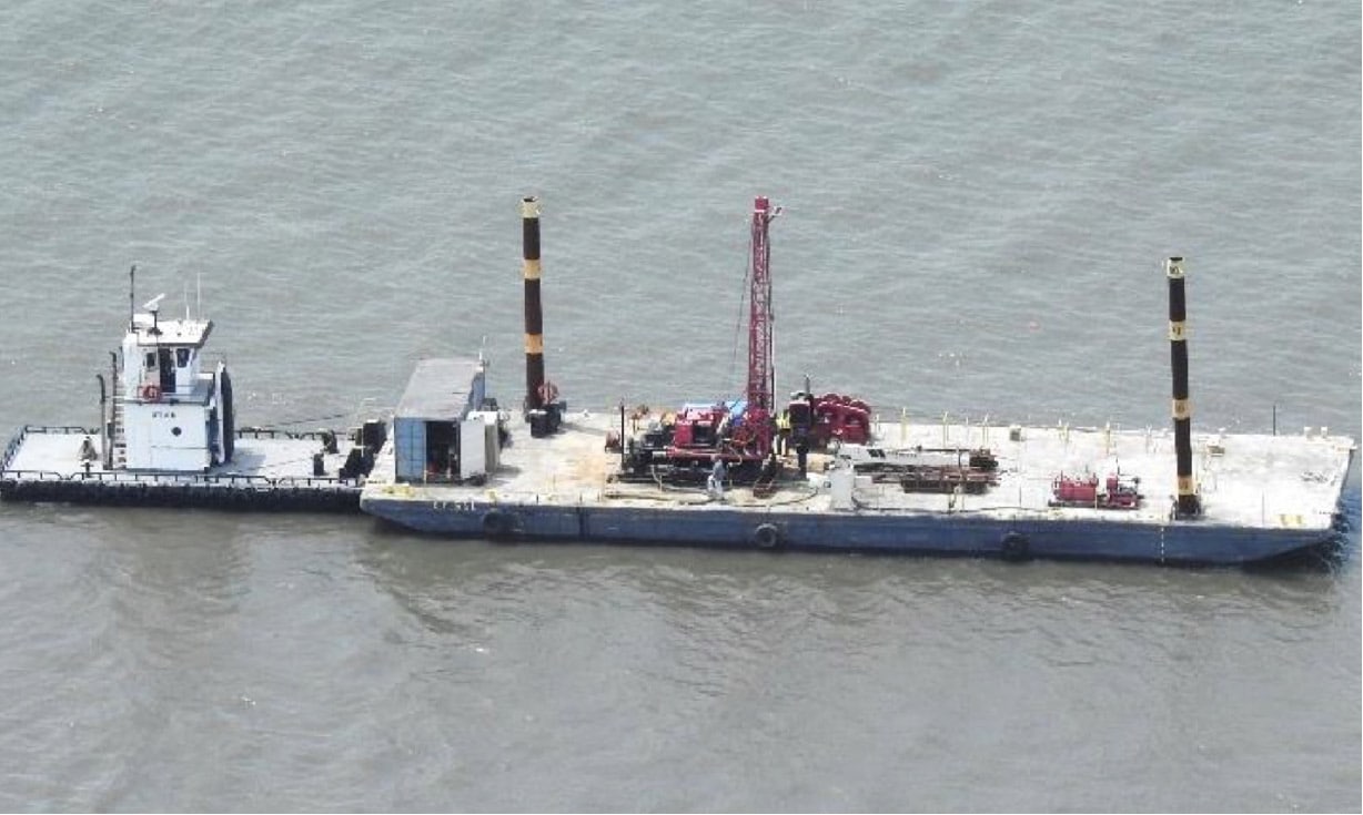 A barge on a body of water.