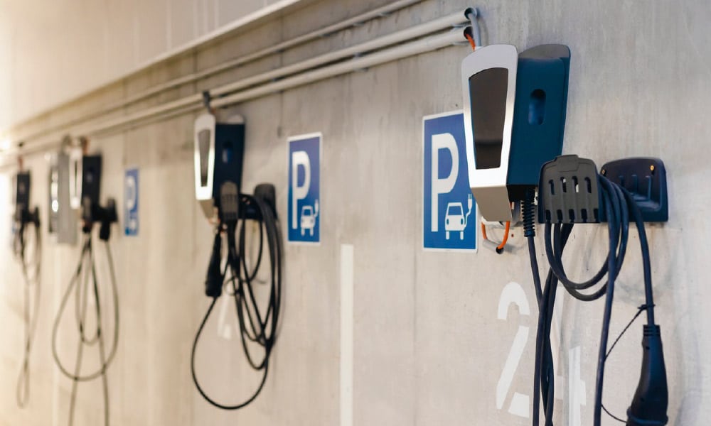 A GPRS Project Manager puts a ground penetrating radar concrete scanner on the concrete pillar of a parking garage.