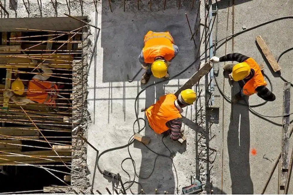 Overhead view of construction workers on a jobsite.